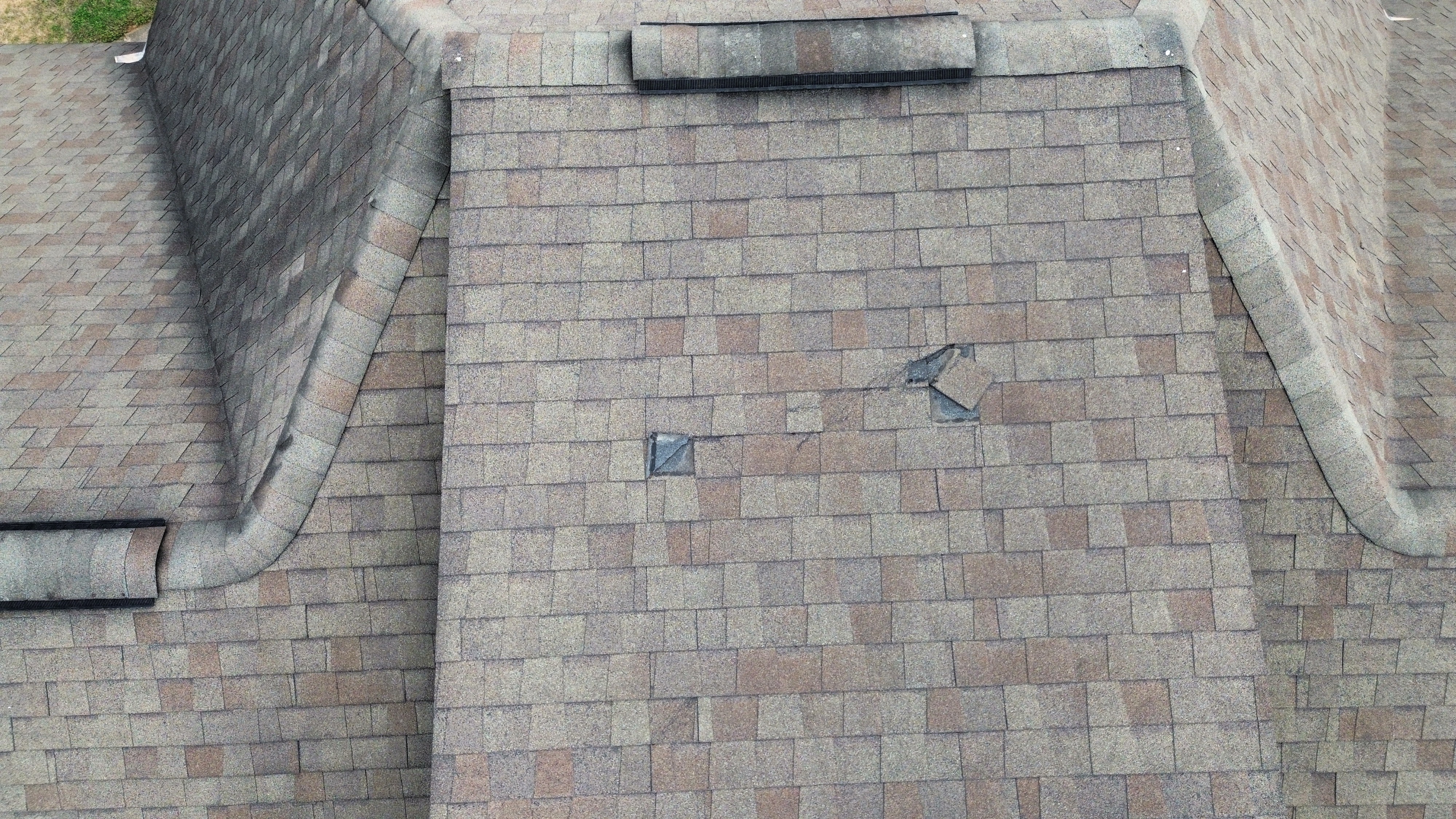 Wind damage to shingles