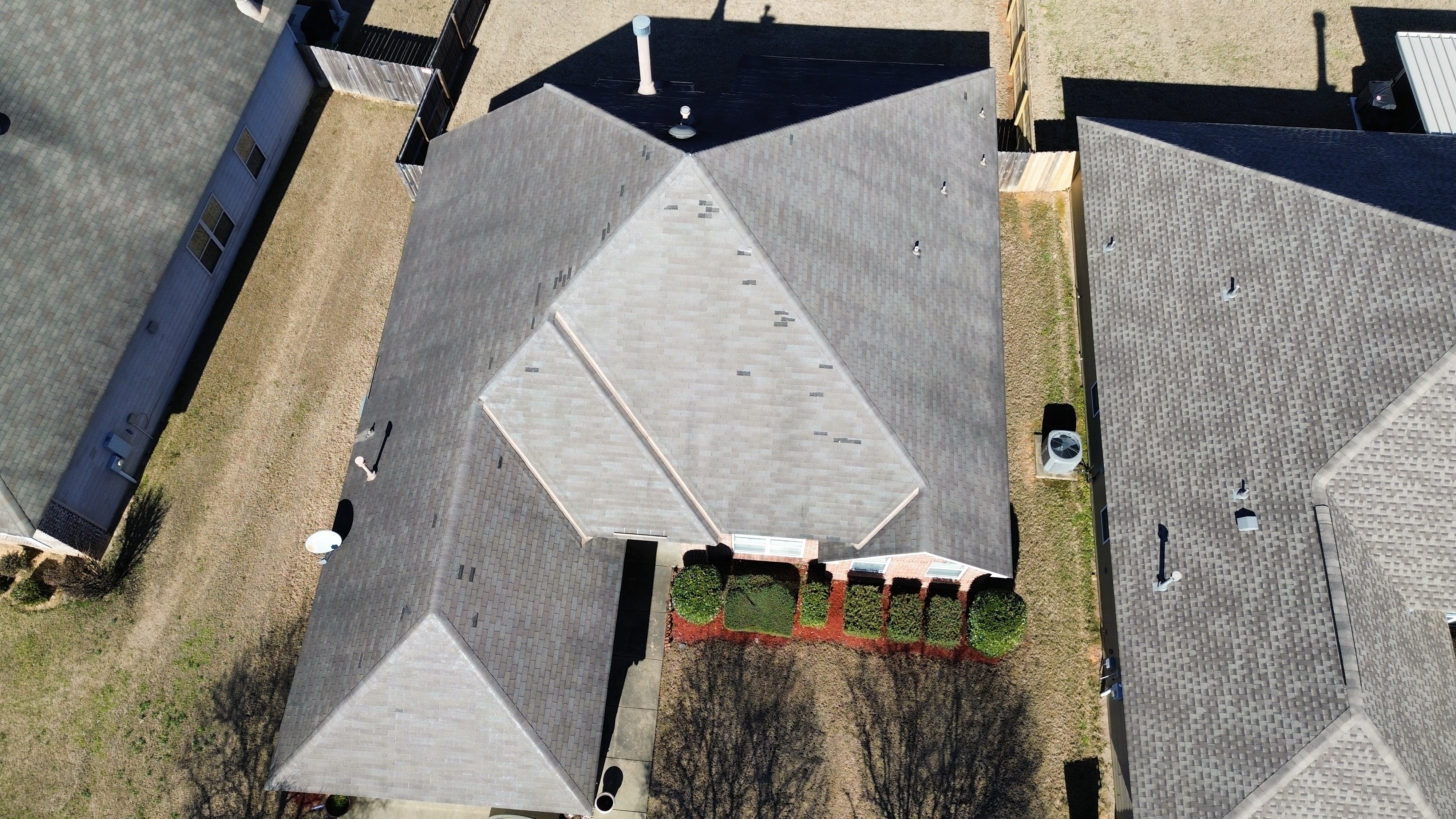 Storm-damaged roof requiring replacement