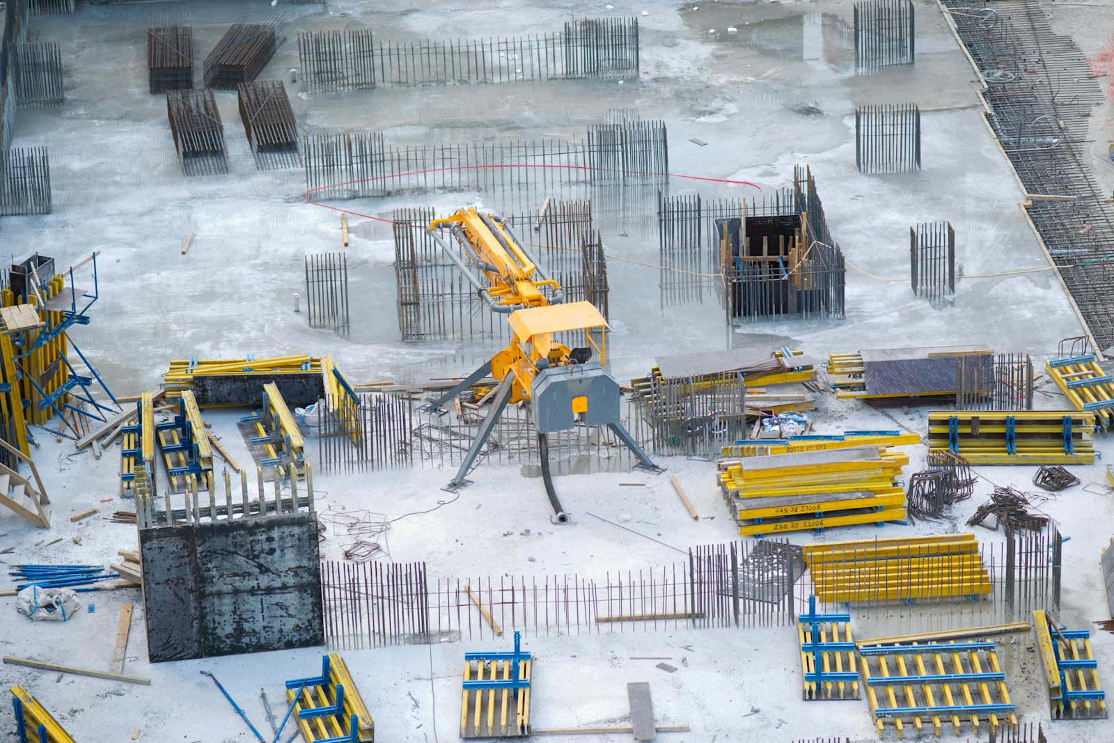 Active development site with coordinated crews and equipment